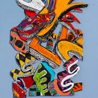 Keeping The Faith I  Framed 33x41 2022-Abstract cutout art piece on paper with warm colors and shapes. This piece is mostly orange and red with hints of green and yellow and black.