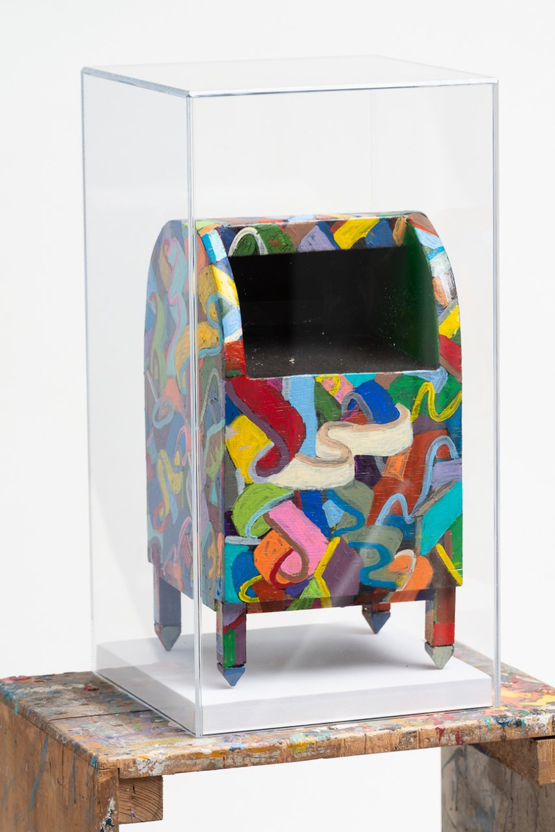 Coat of Many Colors - Mailbox with Abstract Shapes and Various Colors Inside of A Clear Box
