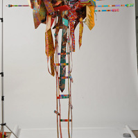 Jacob's Ladder- Abstract Ladder With Abstract Ties On The Top. The Ladder and Ties Are Multicolored.
