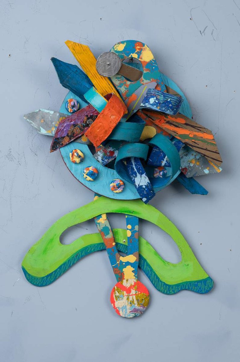 Where Do We Go From Here-Multicolored Abstract Art Piece Hung on A Wall With Various Shapes that Resembles Ties. The Ties are Bent in Various Ways. 