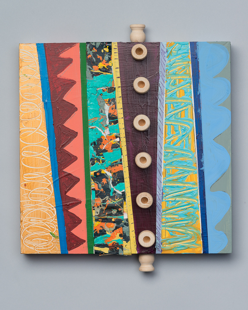 Which Way-Multicolored Abstract Art Painting With Various Patterns and Shapes. This Painting Has Wooden Pegs and Circles in the Middle, Top and Bottom.