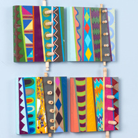 Zig Zag Promise- 4 Multicolored Abstract Art Paintings With Various Patterns and Shapes. This Painting Has Wooden Pegs on the Right.