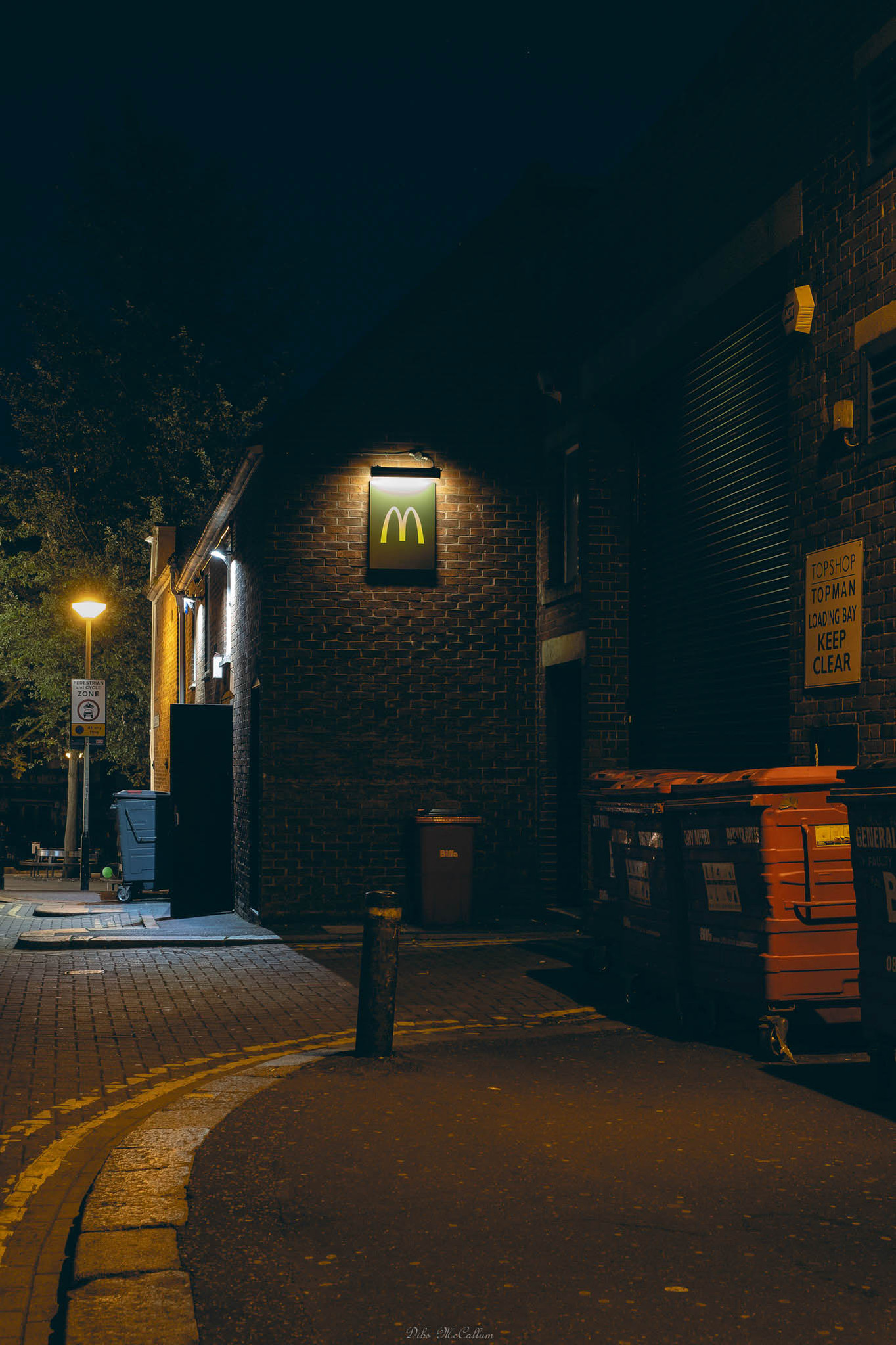 Norwich city centre MacDonald restaurant at night shot from down an alleyway