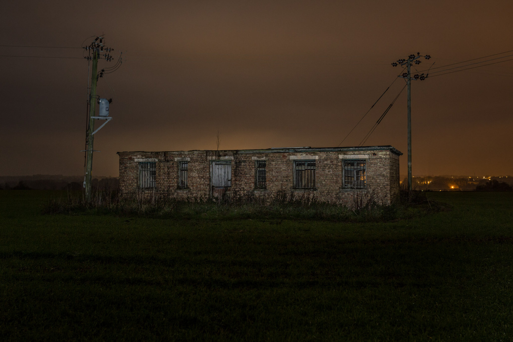 Part of RAF BAWBURGH illuminated at night