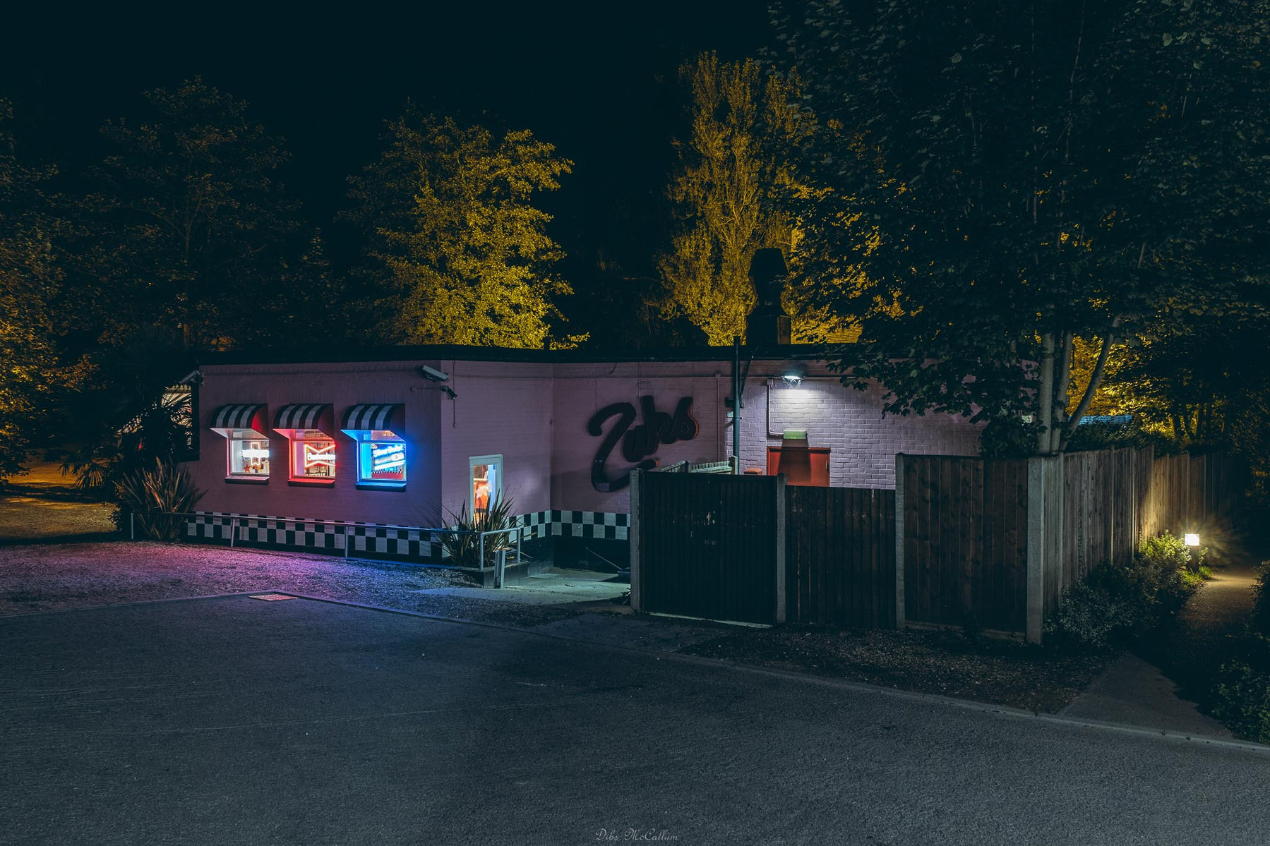 Zacks restaurant in Norwich illuminated by neon lights at night