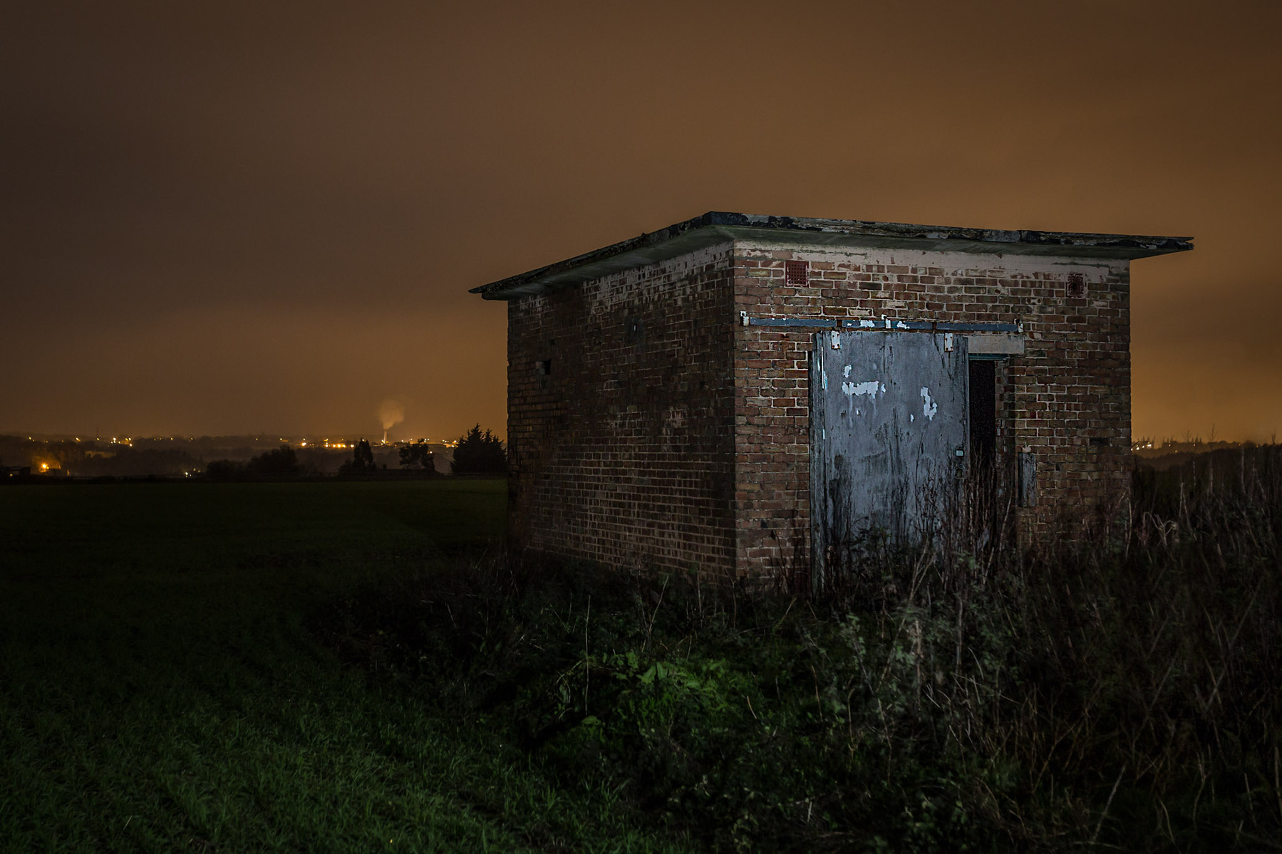 Part of RAF BAWBURGH illuminated at night