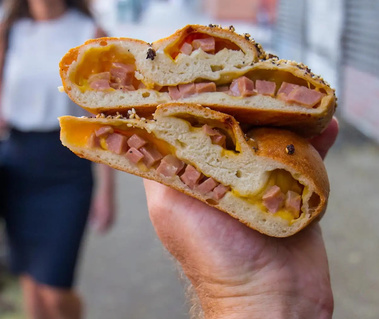 Filled with American cheese and griddled mortadella. 

Photo credit to Scott Lynch (the Gothamist), 2019. 