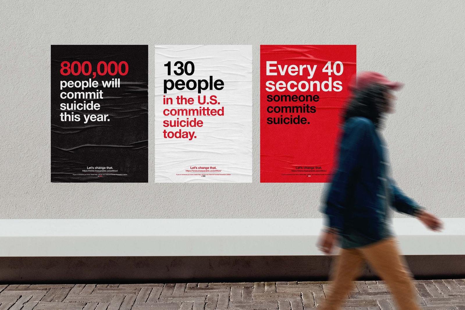 A three-poster series, first black with red and white type, second white with red and black type, third red with black and white type, pasted on a wall with varying facts on suicide rates.