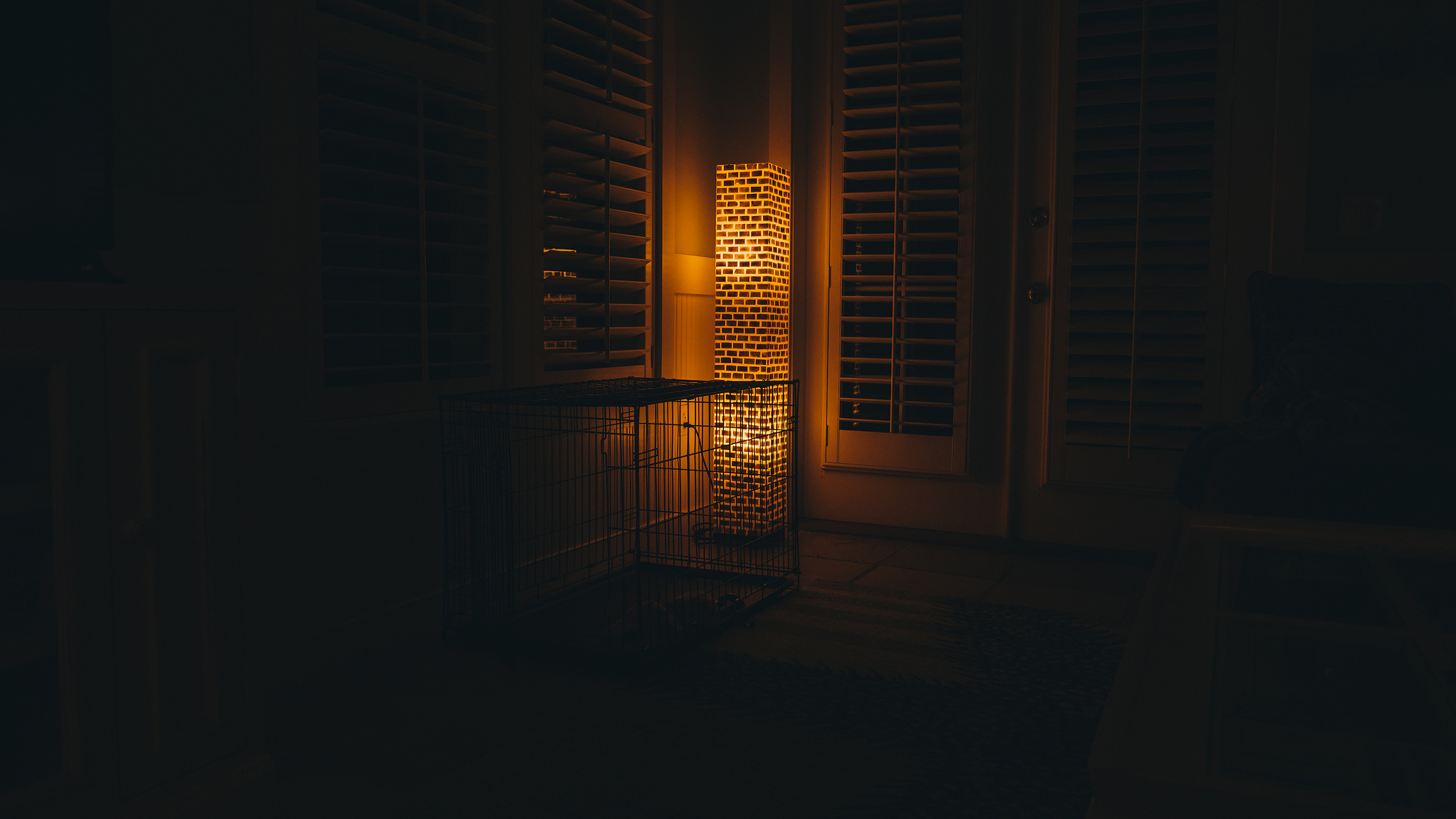 Lamp in the corner of the room.