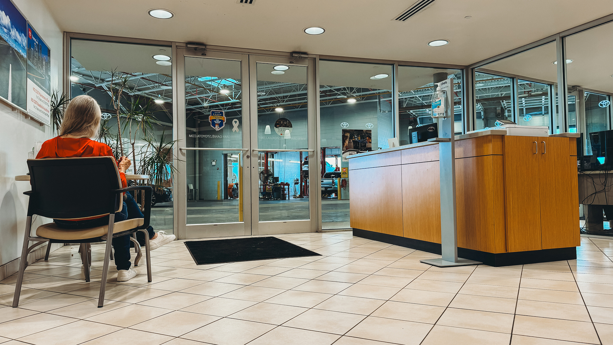 Waiting at the car dealership.