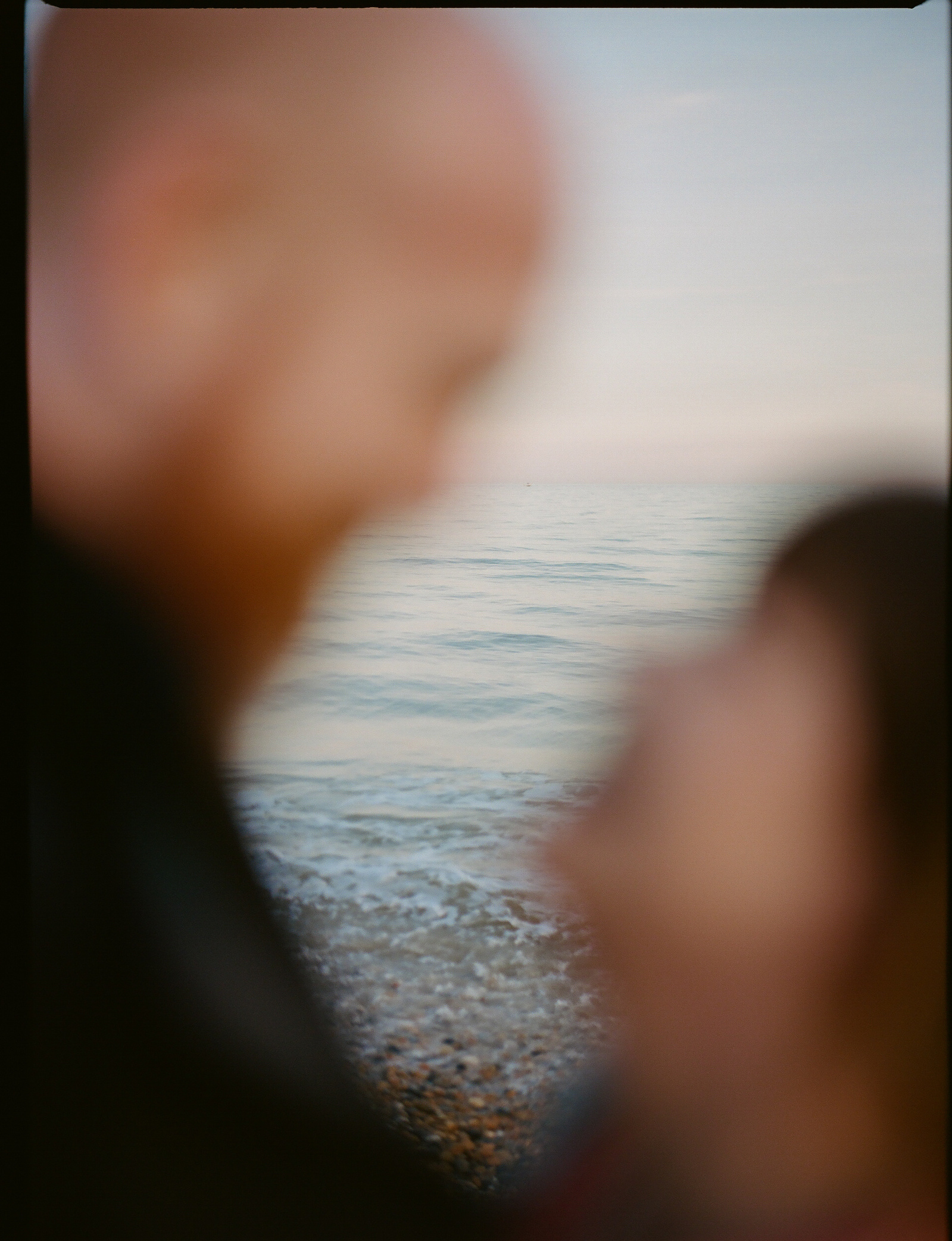 Couple on Brighton beach film photography UK