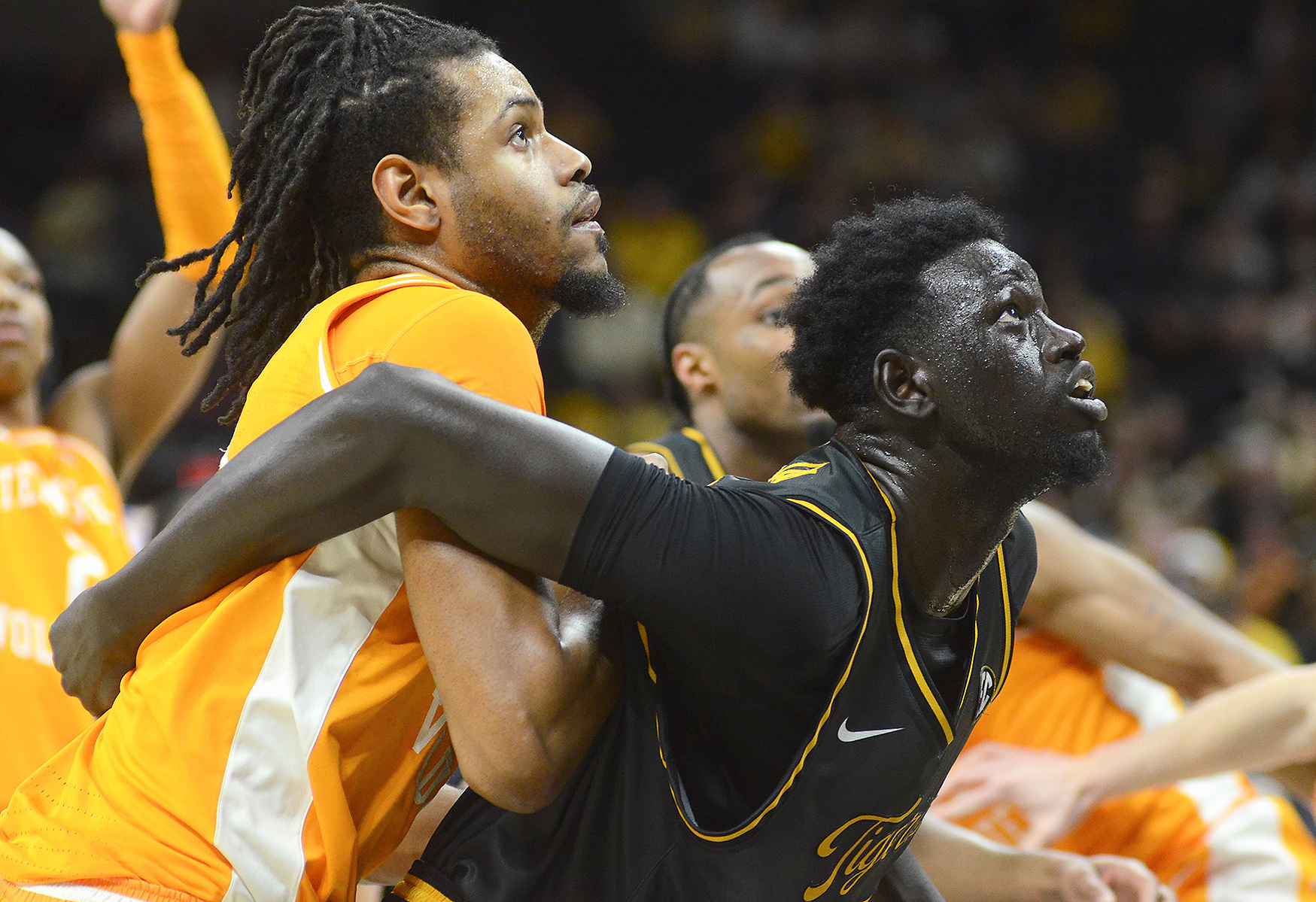 Jonas Aidoo, left, goes for a rebound while Major Majak, right, boxes him out on Tuesday, Feb. 20, 2024 at Mizzou Arena in Columbia. Aidoo finished with four rebounds, while Majak finished with five.