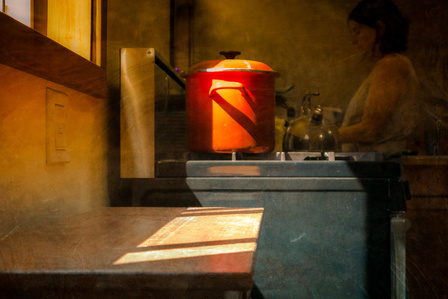 Kitchen corner with window light and red pot