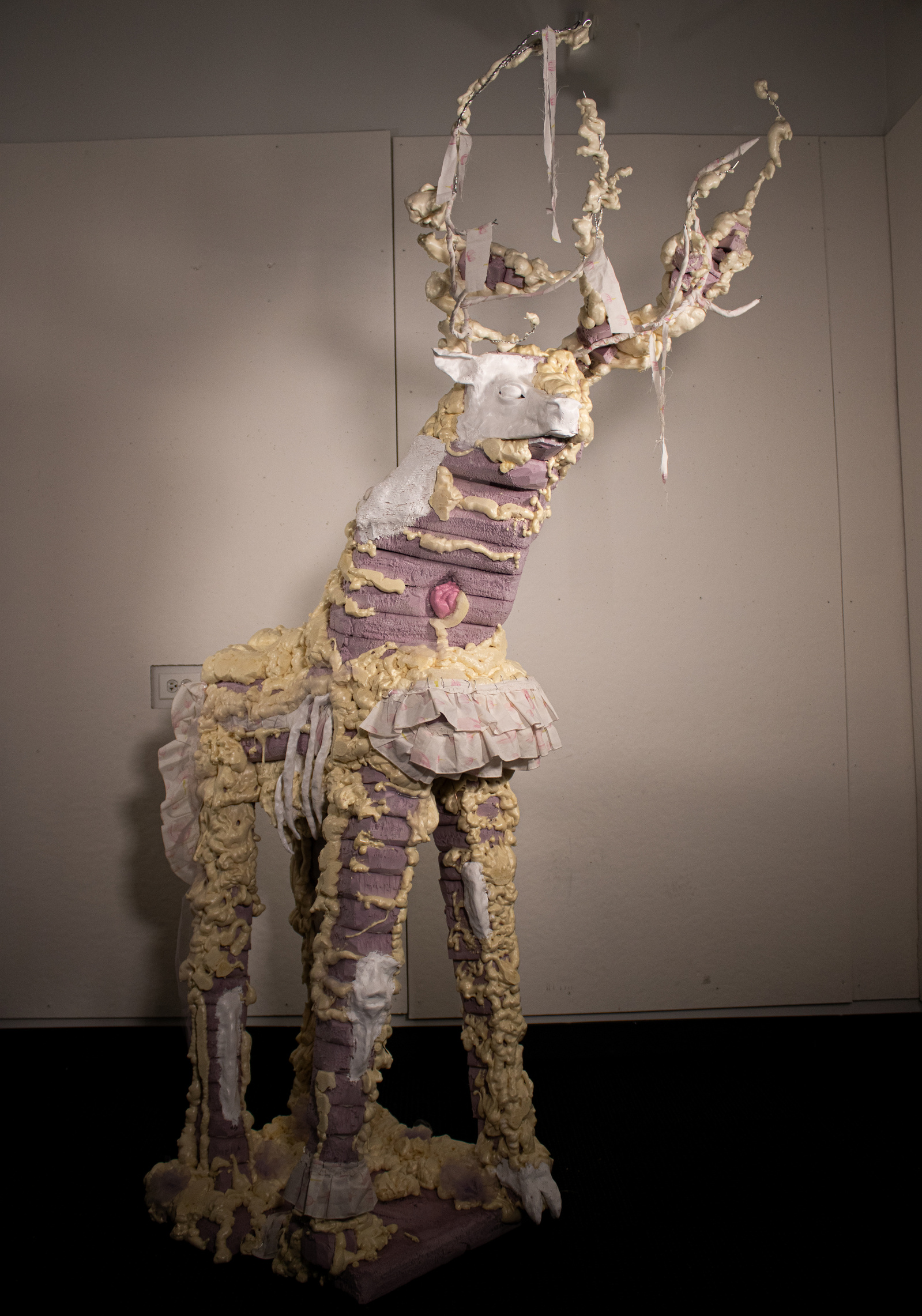 Abstract deer sculpture 6ft tall made from foam, paper-clay, fabric, and wire.