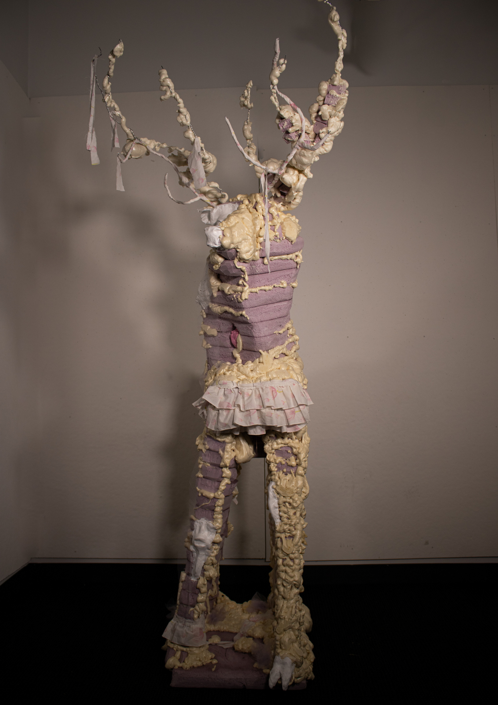 Abstract deer sculpture 6ft tall made from foam, paper-clay, fabric, and wire.