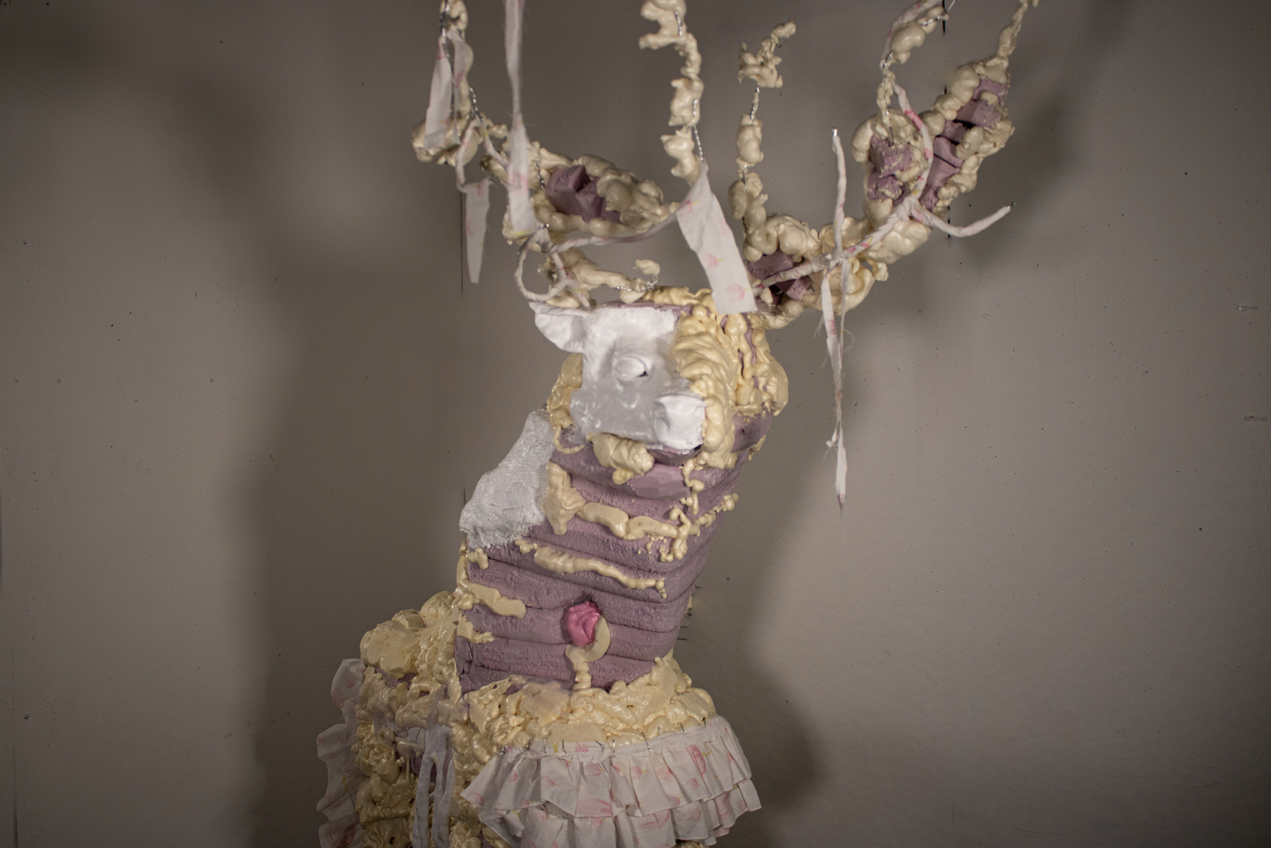 Abstract deer sculpture 6ft tall made from foam, paper-clay, fabric, and wire.