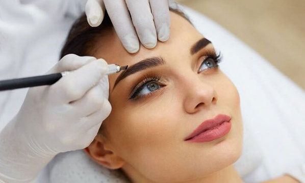 Woman receiving Microblading Service for Eyebrows in Media, PA which is located in the Philadelphia and Delaware County Area