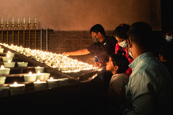 Peopla praying the virgin Marie in Lourdes