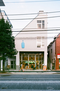 Exterior facade of Blue Bottle Coffee outlet in Japan.