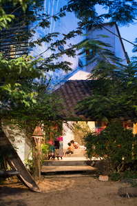 Evening view of the guest bedroom of a house and studio designed by a21studio.