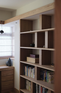 Bookshelves details of an apartment in Toa Payoh designed by Goy Architects.