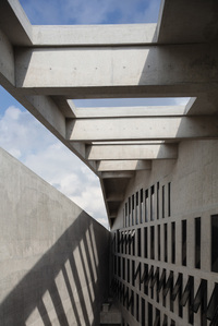 The courtyard roof structure of Wahson Aerospace Facility designed by ipli architects, taken in daytime.