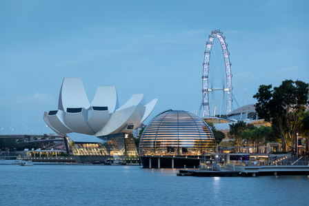View of Apple Store Marina Bay Sands designed by Foster and Partners, the Singapore Flyer, and Art Science Museum design by Moshe Safdie.