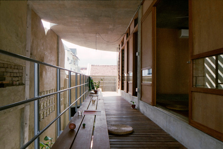 The corridor on the second floor of the Compound House designed by Linghao Architects.