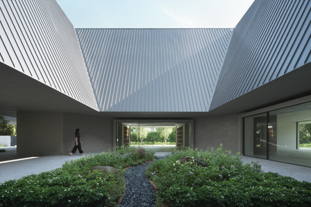 The open to sky courtyard of a house designed by Neri & Hu.
