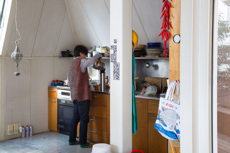 Yoshiharu Tsukamoto making coffee at the pantry of House of Atelier Bow-Wow in Tokyo Japan.
It is designed by Atelier Bow-Wow.
