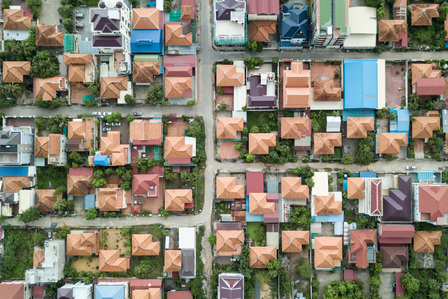 Aerial top-down view of 100 houses designed by Vann Molyvann for the staff of National Bank.
