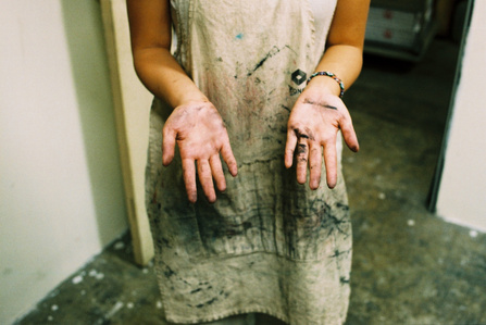 Ink-stained hands.