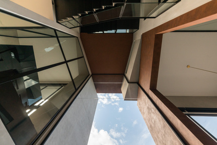Looking up towards the ceiling of House 11 designed by Park + Associates