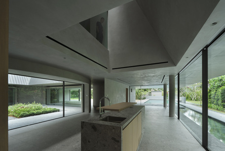 The kitchen and double-storey space of a house designed by Neri & Hu.