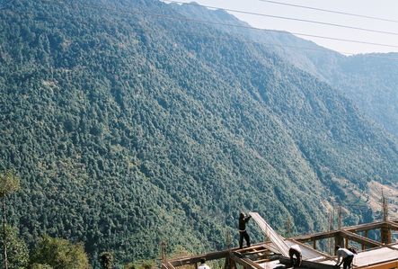 A group of Nepalese workers building a house in the Annapurna region in Nepal.