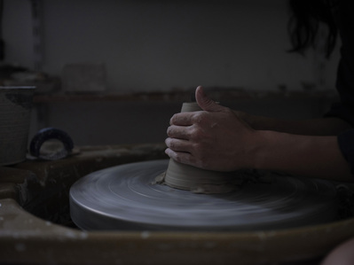 Wheel throwing on a gloomy day.