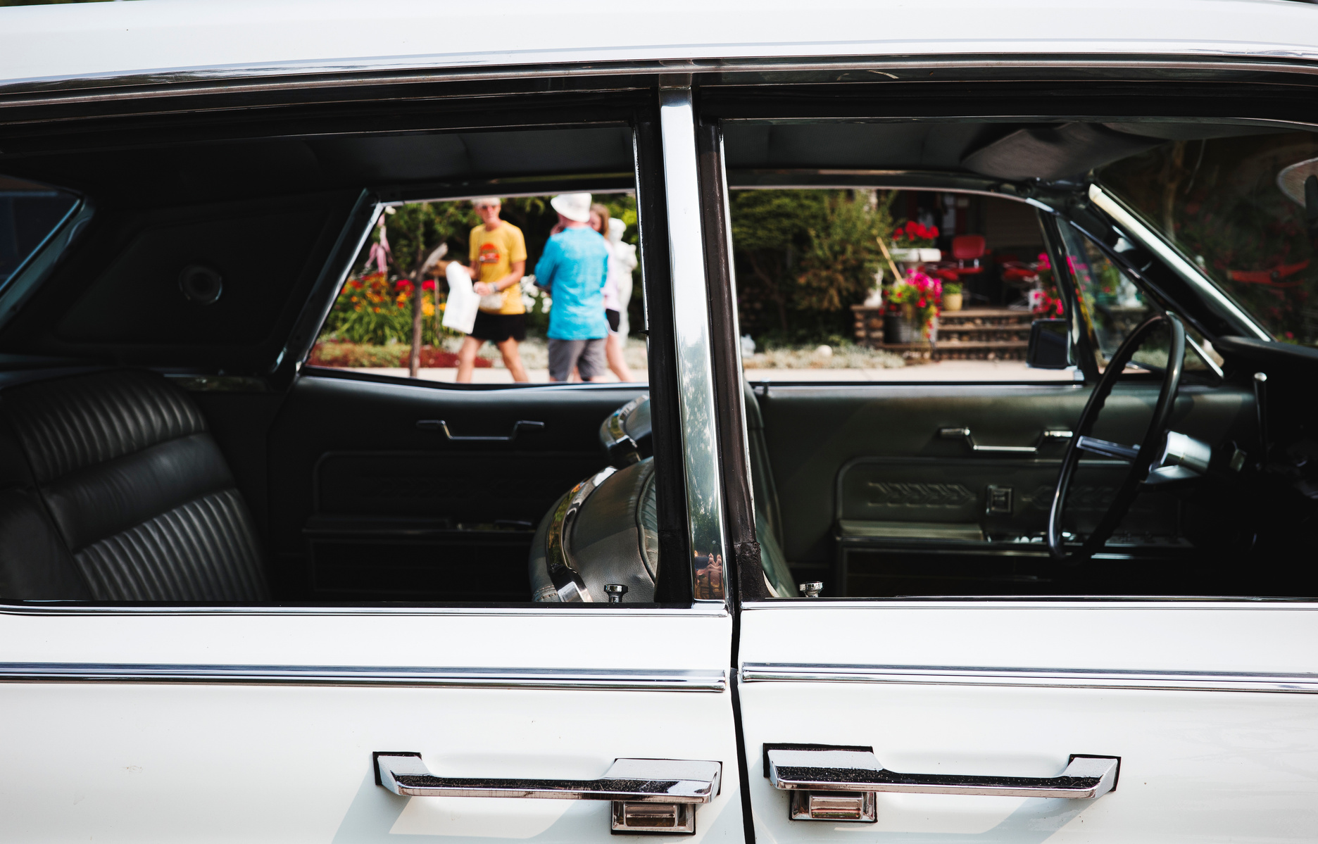 Step back in time with this shot of a classic car’s interior taken in Northport, Michigan. The photo captures vintage styling and community charm, with reflections of visitors enjoying this nostalgic slice of Americana. Ricoh GR