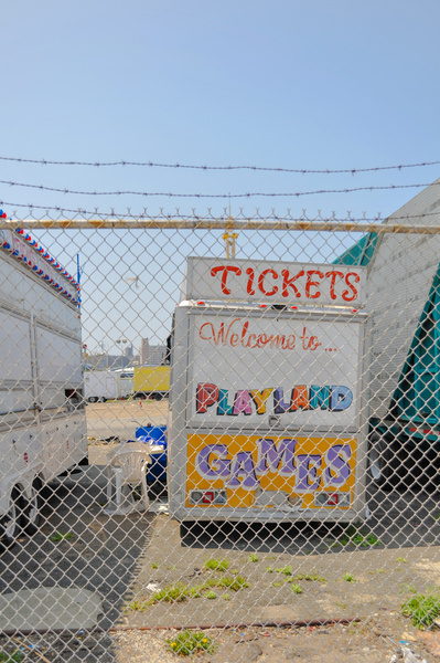 Fun fair truck behind a fence in Coney Island, New York.