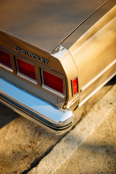 Tail lights of a vintage Chevrolet. Shot on Canon F1, Portra 400.