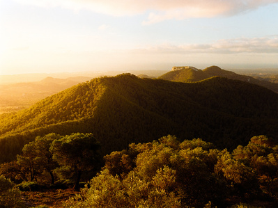 Green mountains at sunrise on Mallorca, Spain. Shot on analog medium format Hasselblad 500CM, Portra 400.