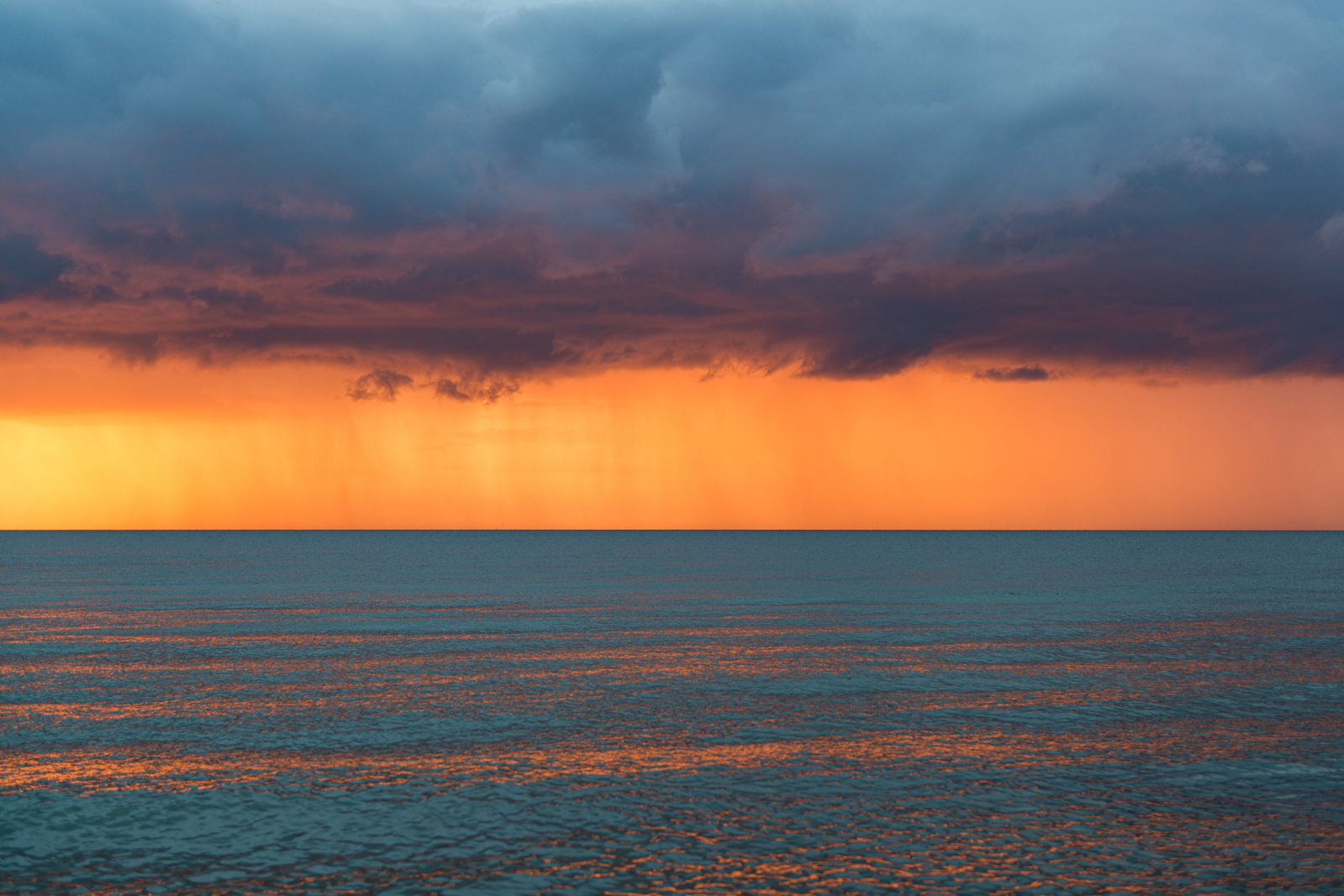 Dramatic thunderstorm at sunset at the baltic sea.