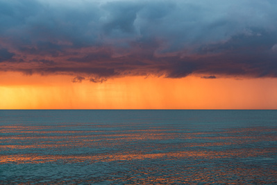Dramatic thunderstorm at sunset at the baltic sea.