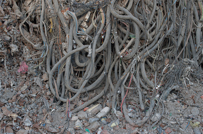 Highly detailed photo of old cables on a scrapyard.
