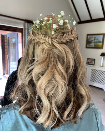 Bridesmaid half up half down wedding hair with a textured effortless finish