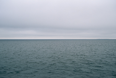 Horizon where the grey sky seems to touch the sea