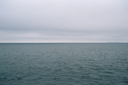 Horizon where the grey sky seems to touch the sea