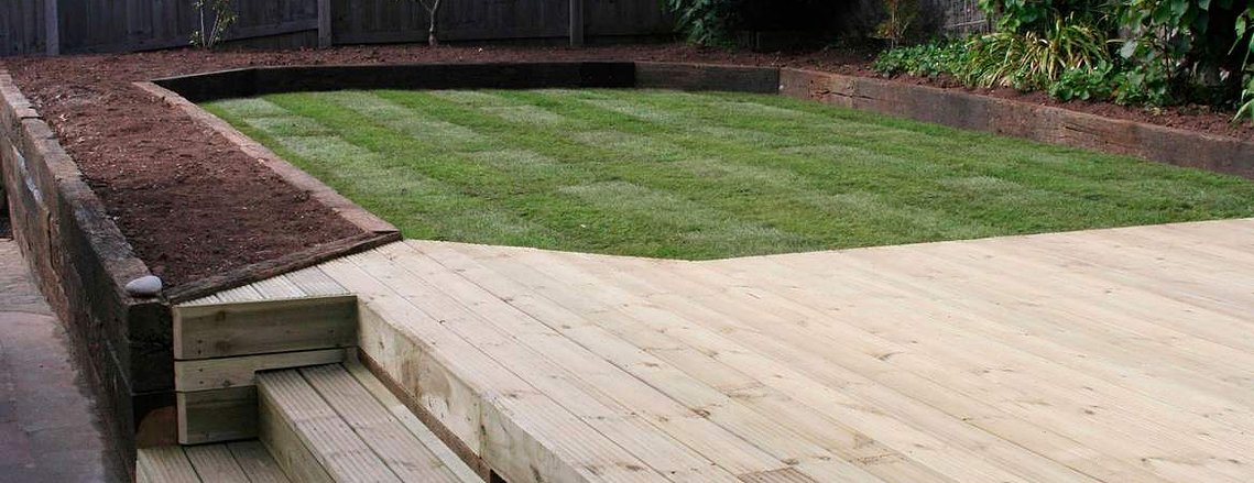 Garden landscaping using decking and lawn in Chirstow Devon, design and build by Seriously Good Landscapes Devon