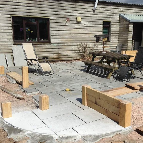 work in progress garden landscaping in Devon by Seriously Good Landscapes using oak timbers to create planting
