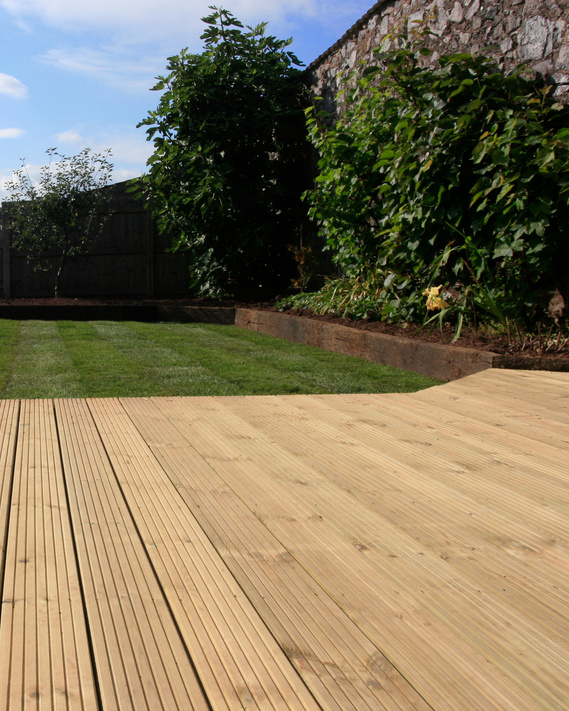 Garden landscaping using decking and lawn in Chirstow Devon, design and build by Seriously Good Landscapes Devon