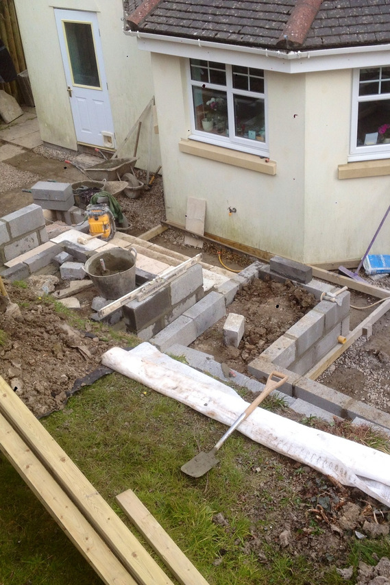 work in progress stylish materials used to create terraced garden in Teignmouth by Seriously Good Landscapes